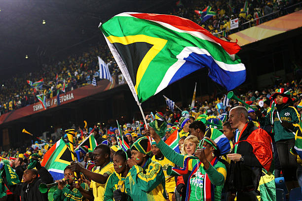 South African fans wave a flag.