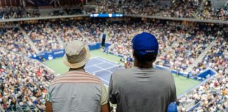 Live Sports Coverage Fuels Growth of Digital Entertainment Services A couple of men in a stadium