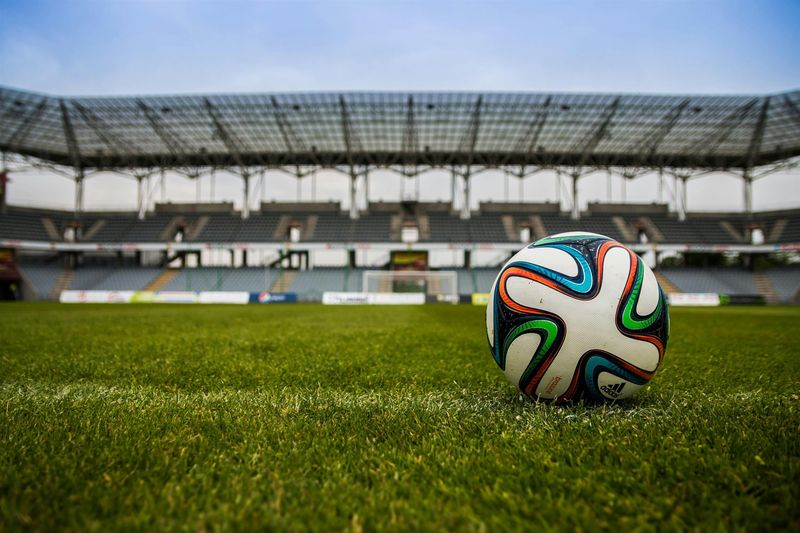 Soccer ball on a lush grass field